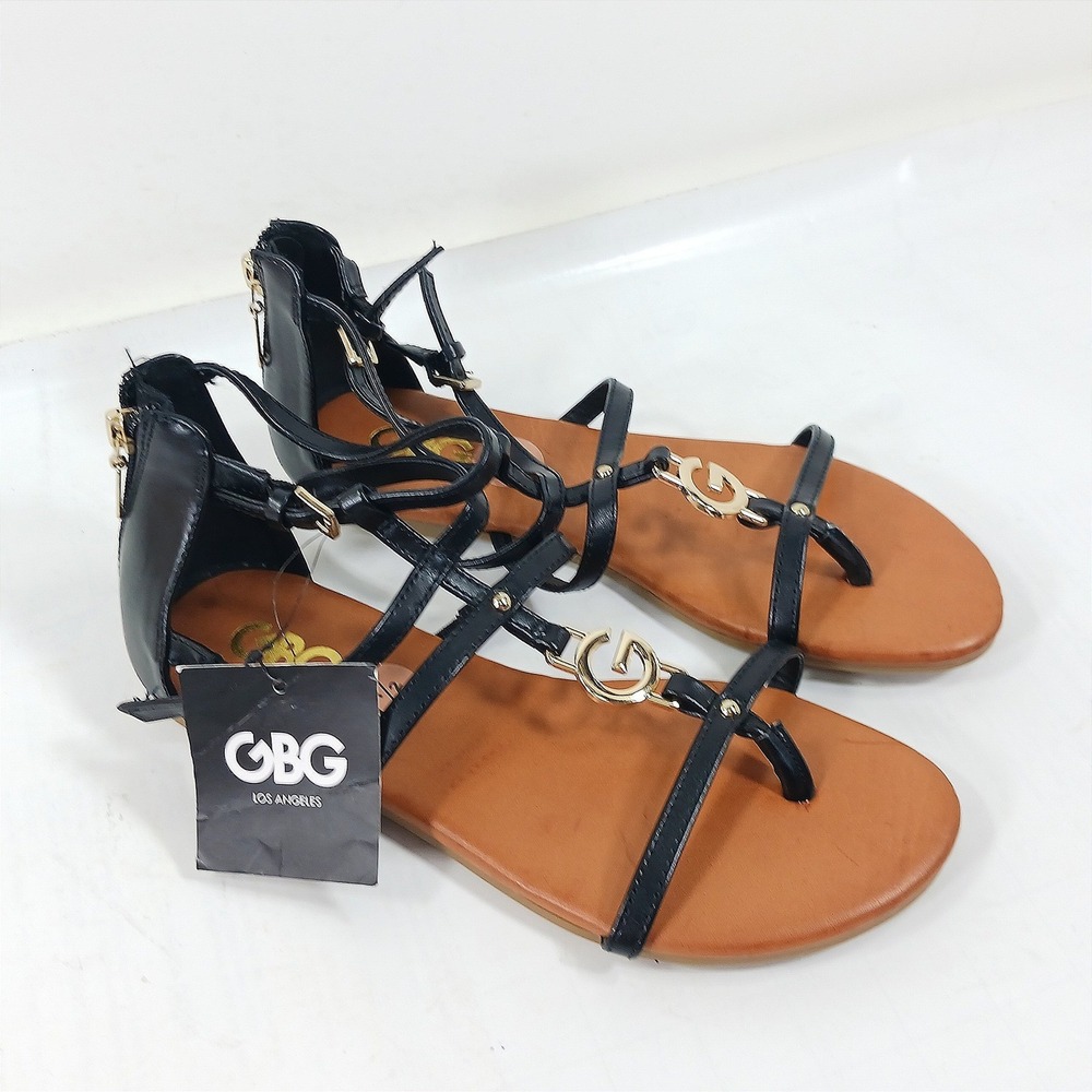 GBG Los Angeles G-Lessy Black Strappy Gladiator Flat Sandals Gold Logo NEW 7.5M